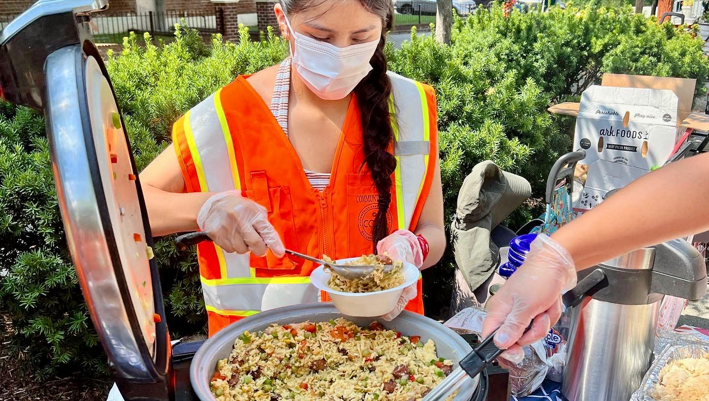 Volunteer serving food